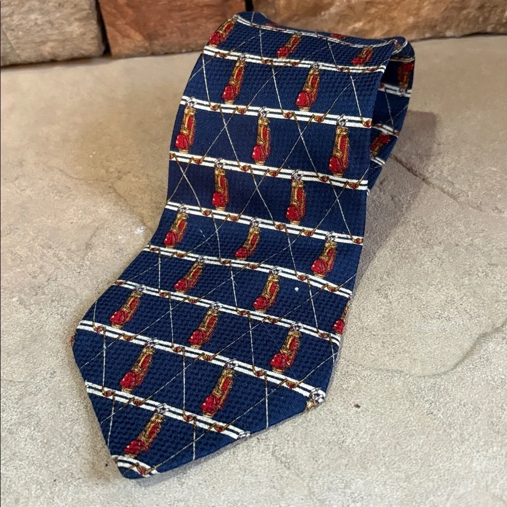 Tommy Hilfiger 100% imported silk tie with golf clubs and stars